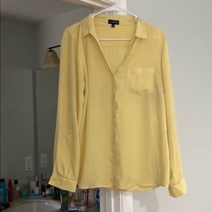 Yellow button down long sleeve shirt
